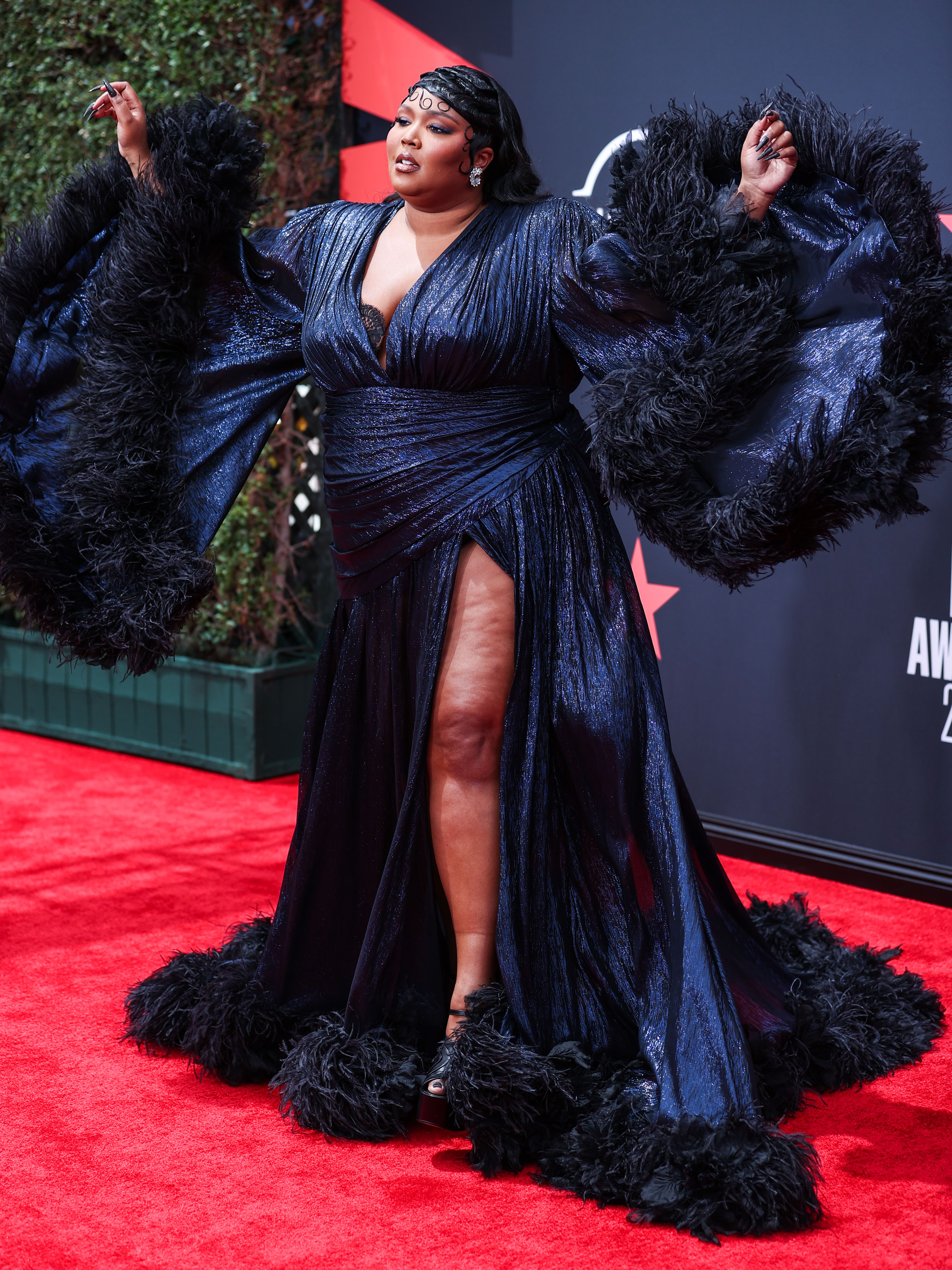Megan Thee Stallion Makes Her Oscars Debut in Dramatic Blue Dress